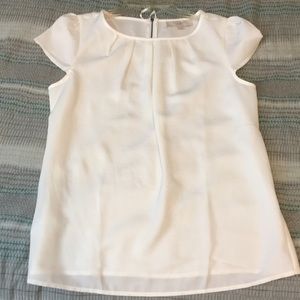 Cream colored blouse